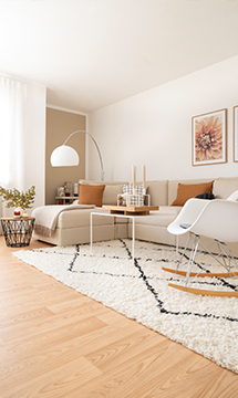 portrait picture of a fall living room created with a linen slipcover