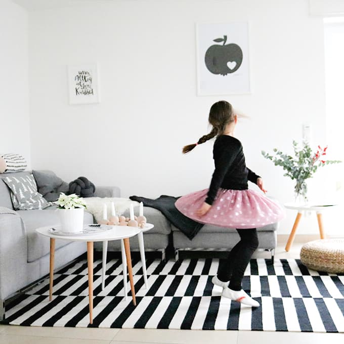 girl dances at living room